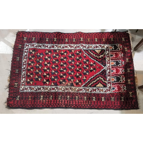 646 - A Turkoman rug with repeated star motif, 140 x 92 cm