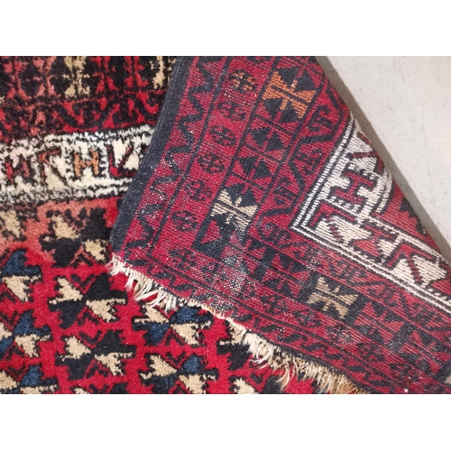 646 - A Turkoman rug with repeated star motif, 140 x 92 cm