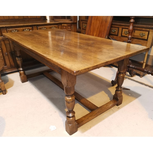 675 - A Titchmarsh & Goodwin distressed oak dining suite comprising rectangular table on turned  bulbous l... 