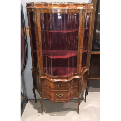 628 - A French Louis Phillippe style display cabinet, with inlaid serpentine front and ormolu mounts, 83 c... 