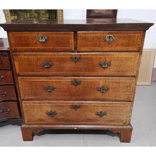 652 - An 18th century walnut straight front chest of 3 long and 2 short drawers, with herringbone inlay br... 