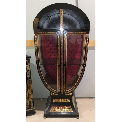 658 - A 19th century continental ebonised display cabinet with Biedermeier style boullework, shaped oval f... 