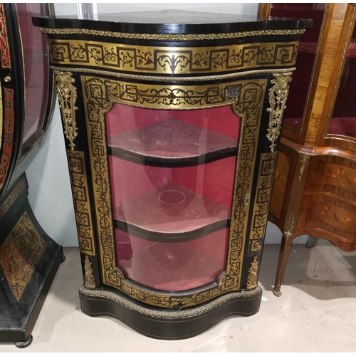 659 - A 19th century continental pair of corner display cabinets, with ormolu mounted boullework and eboni... 