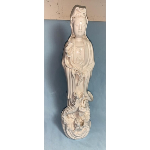 193 - A blanc de chine figure of Gwan Yin, height 38 cm