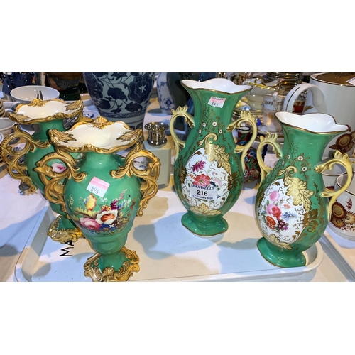 216 - A 19th century pair of 2 handled baluster vases in the rococo style, with polychrome floral decorati... 