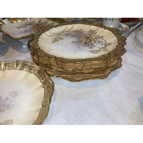 226 - A Doulton Burslem 9 piece dessert service decorated with floral sprays edged with raised giltwork