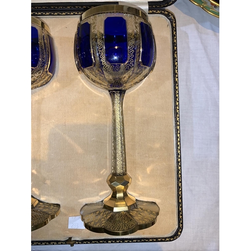 233 - An early 20th century pair of wedding goblets, blue overlaid cut crystal, in presentation case, 20 c... 