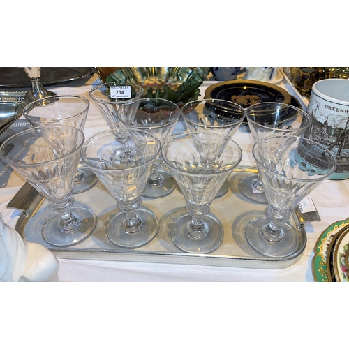 234 - A 19th century set of 9 wine goblets with conical bowls, 14 cm