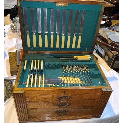 311 - An EPNS part canteen of cutlery with bone handled knives in oak 3 drawer box with rising lid