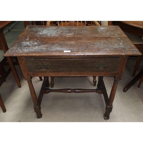 639 - An 18th century style oak side table with frieze drawer, on turned legs