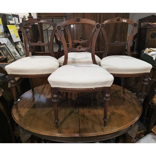 644 - A Victorian set of 4 walnut dining chairs, upholstered overstuffed seats