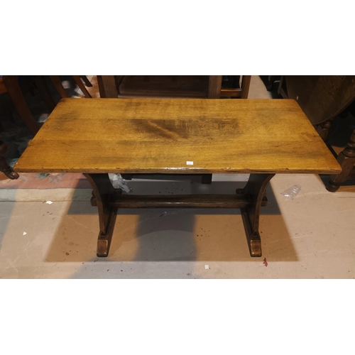 683 - A refectory style distressed oak coffee table; a barley twist occasional table with rectangular top