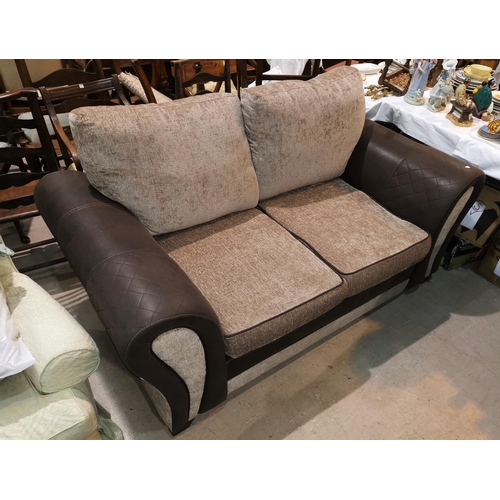 711 - A modern two seat settee in brown and fawn coloured upholstery L 172cm