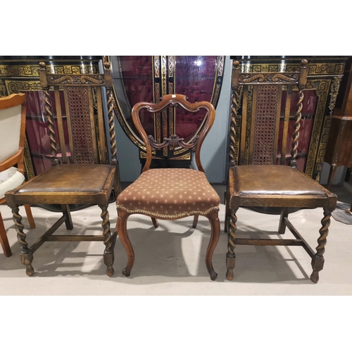 703 - A rosewood dining chair on knurled legs; a pair of Carolean style dining chairs on barley twist legs