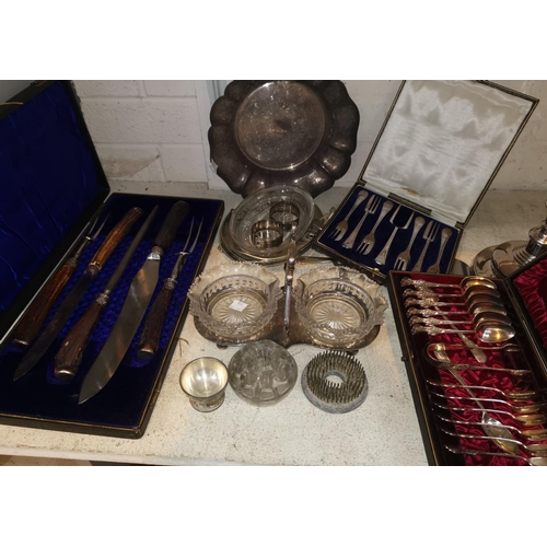 318 - A part carving set by Thomas Turner, boxed; a silver plated teaspoon and tongs set, boxed; other sil... 