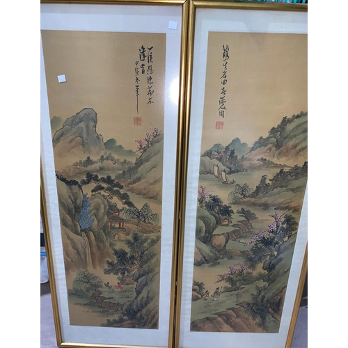 515 - A Chinese pair of scroll paintings on silk, 90 x 30 cm, gilt framed