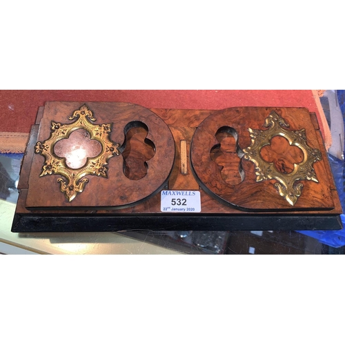 532 - A 19th century figured walnut Betjeman's Patent bookrack with ormolu mounts, Phillipson and Golder, ... 