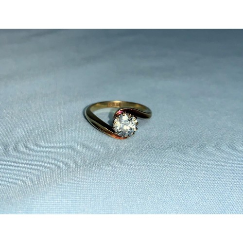 278 - An 18 carat gold ring with solitaire diamond in crossover setting, diamond weight 1.17 ct approx., s... 