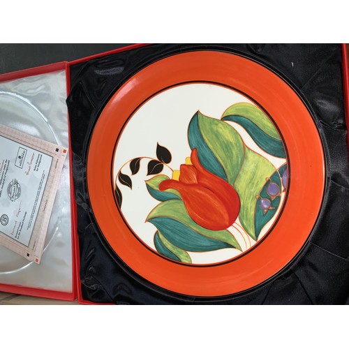 201 - Four Wedgwood limited edition plates, Clarice Cliff design, diameter 26 cm; a similar larger plate