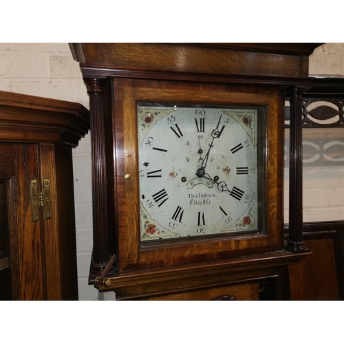 555 - An early 19th century oak longcase clock, the later case with mahogany crossbanding, the hood with b... 