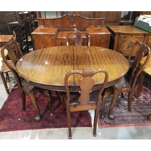 563 - A reproduction mahogany Queen Anne style dining room suite comprising oval extending dining table on... 