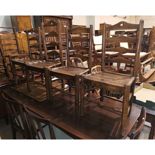 629 - A 19th century harlequin set of 4 elm  country made chairs with ladder backs and solid seats, on clu... 