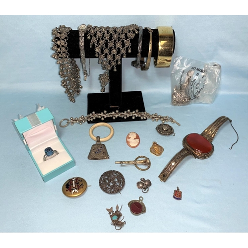 291 - A selection of white metal jewellery including a marcasite watch; bangles; etc.