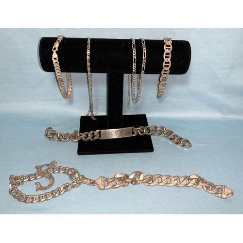 294 - A heavy silver identity bracelet and items of white metal chain, 7 ozt