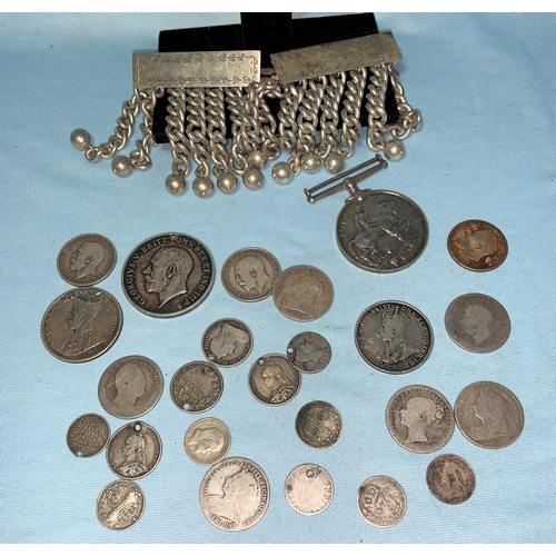 316 - Two WWI medals (a.f.); 2 white metal chain ornaments; a small quantity of silver coins, 9 ozt
