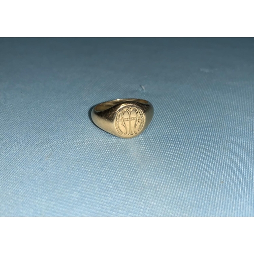 343 - A monogrammed signet ring with internal inscription, unmarked, tests as 18 ct, 5.5 gm