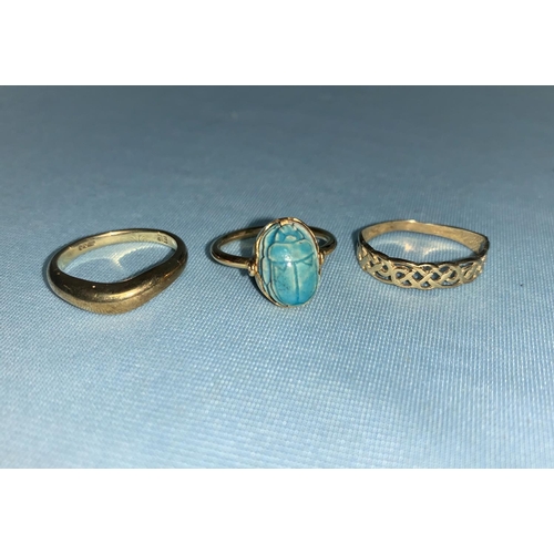 344 - Two 9 carat hallmarked gold rings, 3.9 gm; a 'scarab beetle' ring, unmarked tests as 18 ct, gross we... 