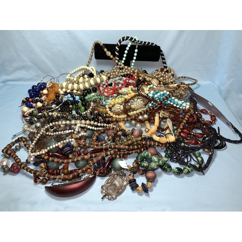 391 - A large selection of costume bead and other necklaces