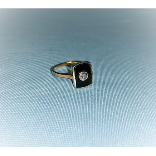 445 - An Art Deco dress ring set single diamond in black onyx surround, the shank stamped '18 ct' & 'PLAT'