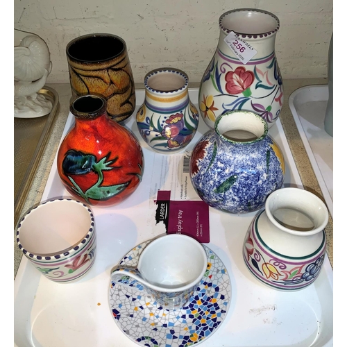 256 - A selection of Poole pottery vases; a Gaudi cup  and saucer