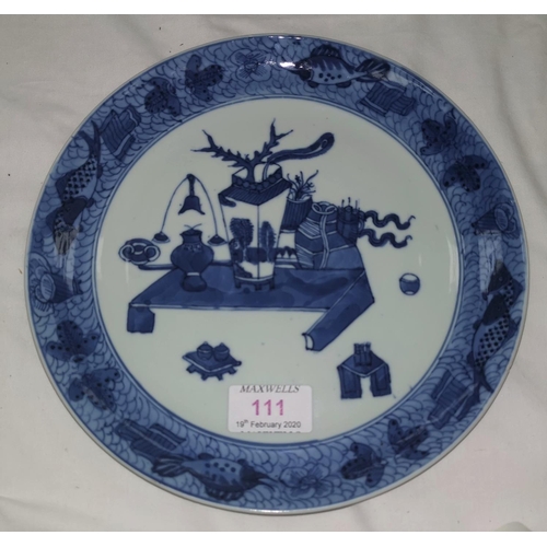 111 - A 19th century Chinese blue and white plate with detailed border and central decoration of vases, 23... 