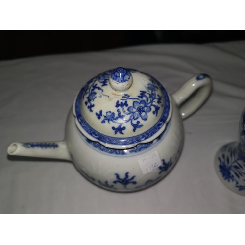 113C - An 18th century Chinese blue and white teapot (restoration to spout and lid0 another Chinese teapot ... 