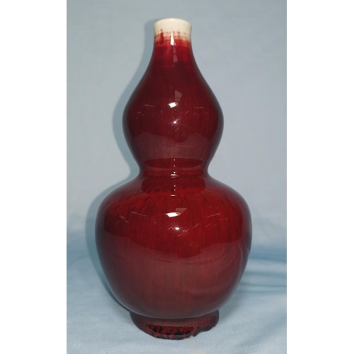 114B - A Chinese flambe double gourd shape vase signed and double circle to base, height 20cm