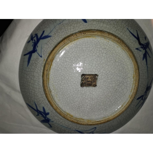118a - A Chinese blue and white crackle glaze charger with character mark to base, 36cm