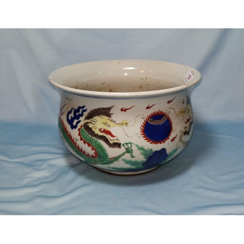 126 - A Chinese Qing circular censer bowl of baluster form, with polychrome decoration of dragons, 25 cm d... 