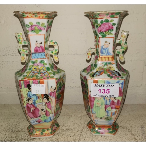 135 - A Chinese Canton pair of porcelain vases, hexagonal baluster form, 18 cm (handles a.f.)