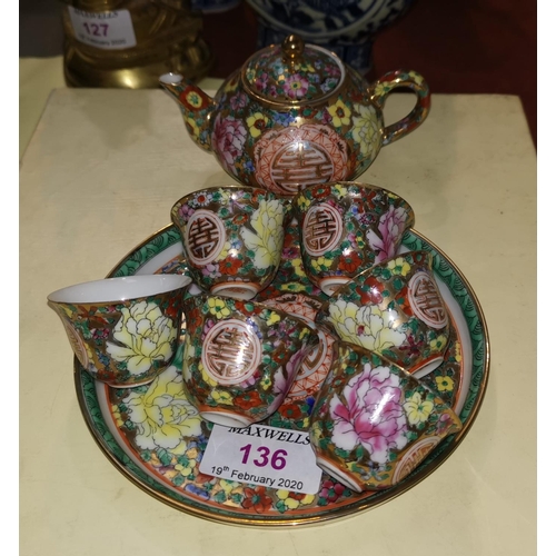 136 - A Chinese porcelain miniature tea set with millefiori decoration