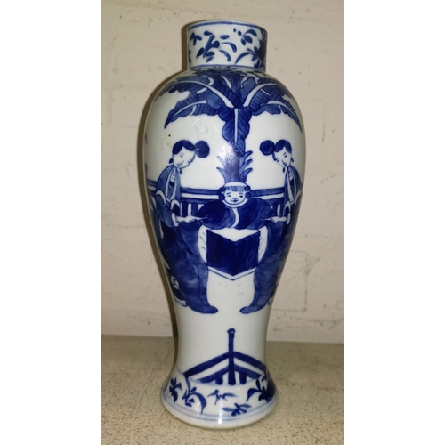 139 - A Chinese porcelain inverted baluster vase decorated in underglaze blue with a genre scene, 26 cm