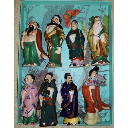 144 - A Chinese Republic group of 8 porcelain figures, 9.5 cm