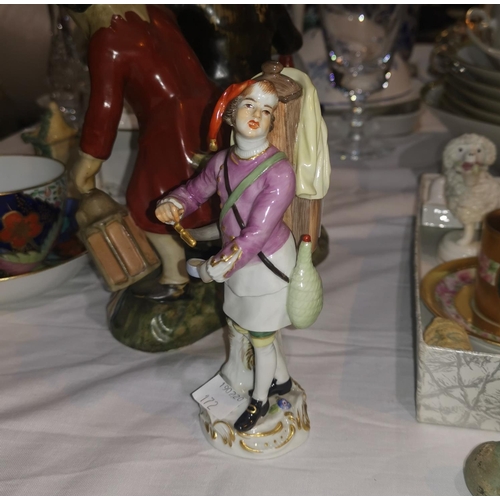 172 - A late Meissen figure of a street vendor; an Egyptian mummy figure and other miniature china and gla... 