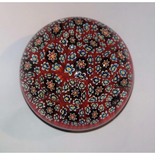 173 - A millefiori paperweight in the Baccarat style