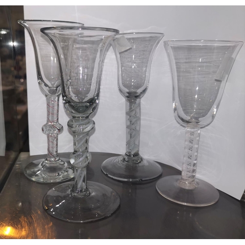 174 - Two 18th century style wine with opaque twist stems; 2 similar Georgian glasses (small chips to foot... 