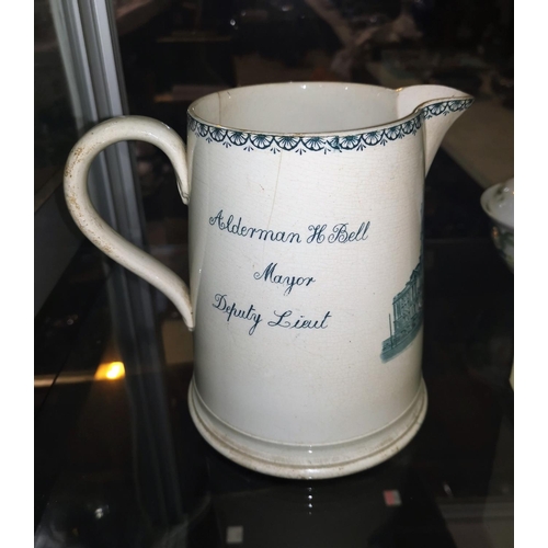 198 - A rare pottery jug commemorating the opening of Stockport Town Hall July 7th 19089 (a.f.), 17 cm