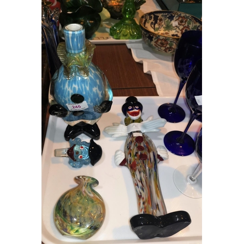 245 - Two Murano clown bottles and a selection of coloured glassware