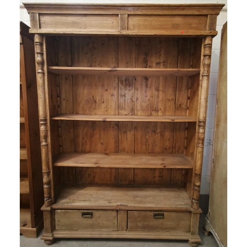 541 - A pine rustic 4 height bookcase with 2 drawers
