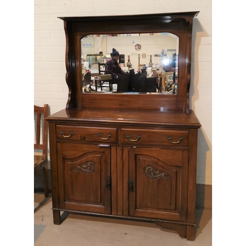 568 - An Art Nouveau style walnut sideboard with mirror back, 2 drawers and double cupboard